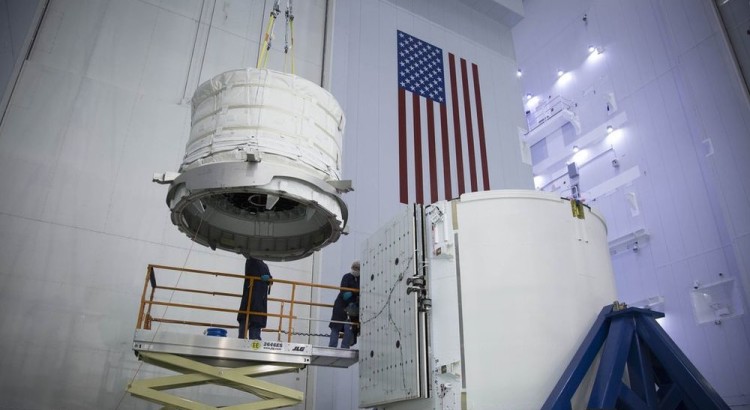 BEAM Capsule being loaded on to SpaceX's Dragon Capsule.